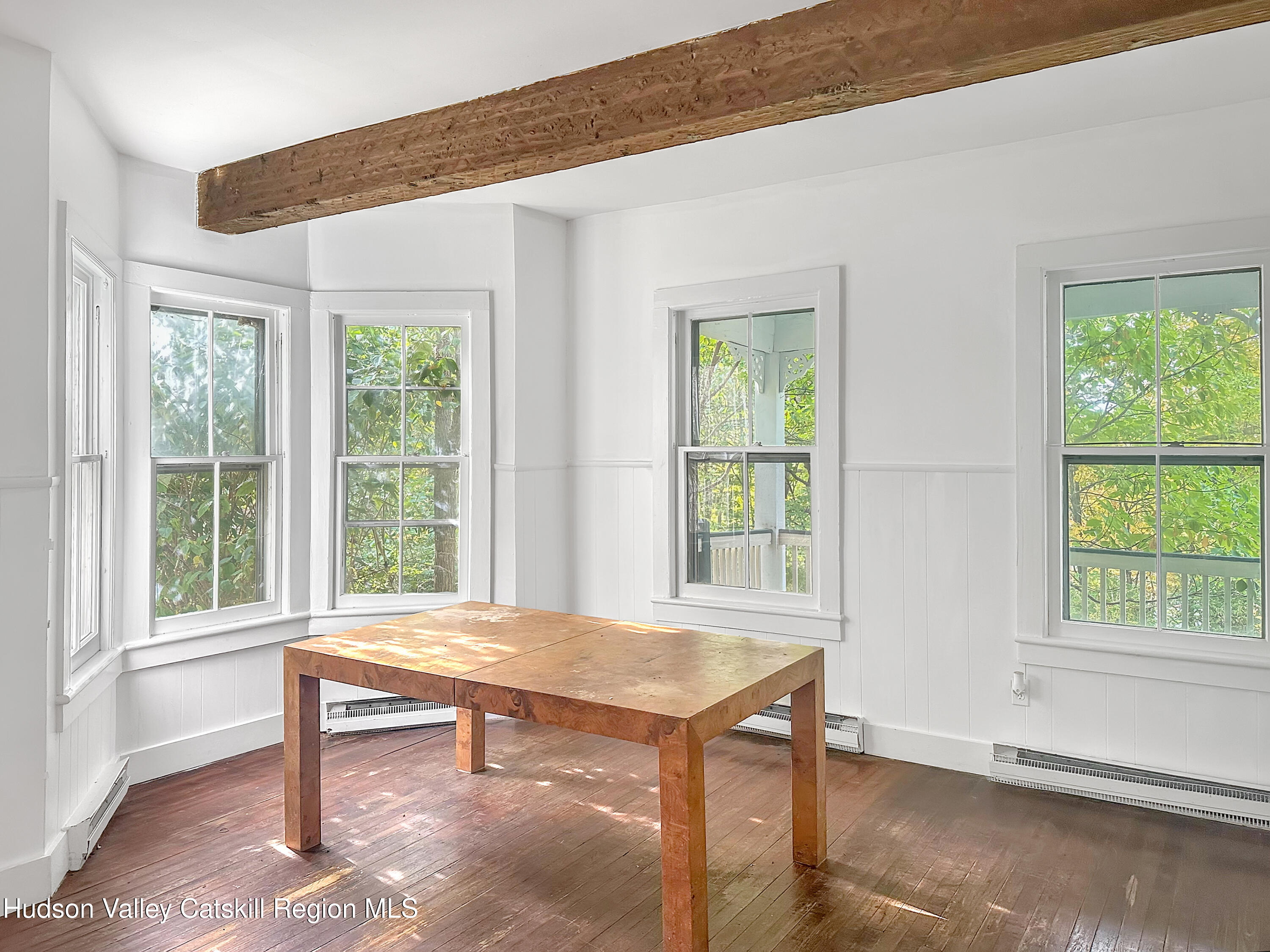 72 Meads Mountain Road, Unit 5 Woodstock, NY 12498 - Photo 7 of 20 a view of a room with furniture and windows