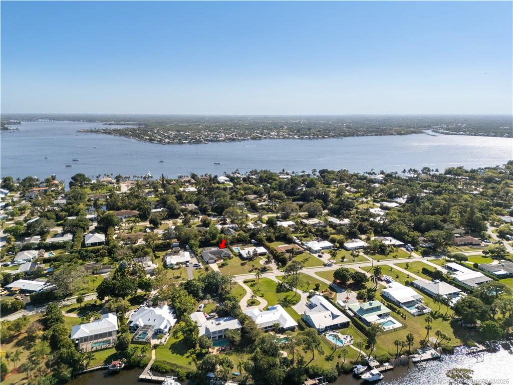 853 Northwest Spruce Ridge Drive Stuart, FL 34994 - Photo 19 of 20 an aerial view of a city