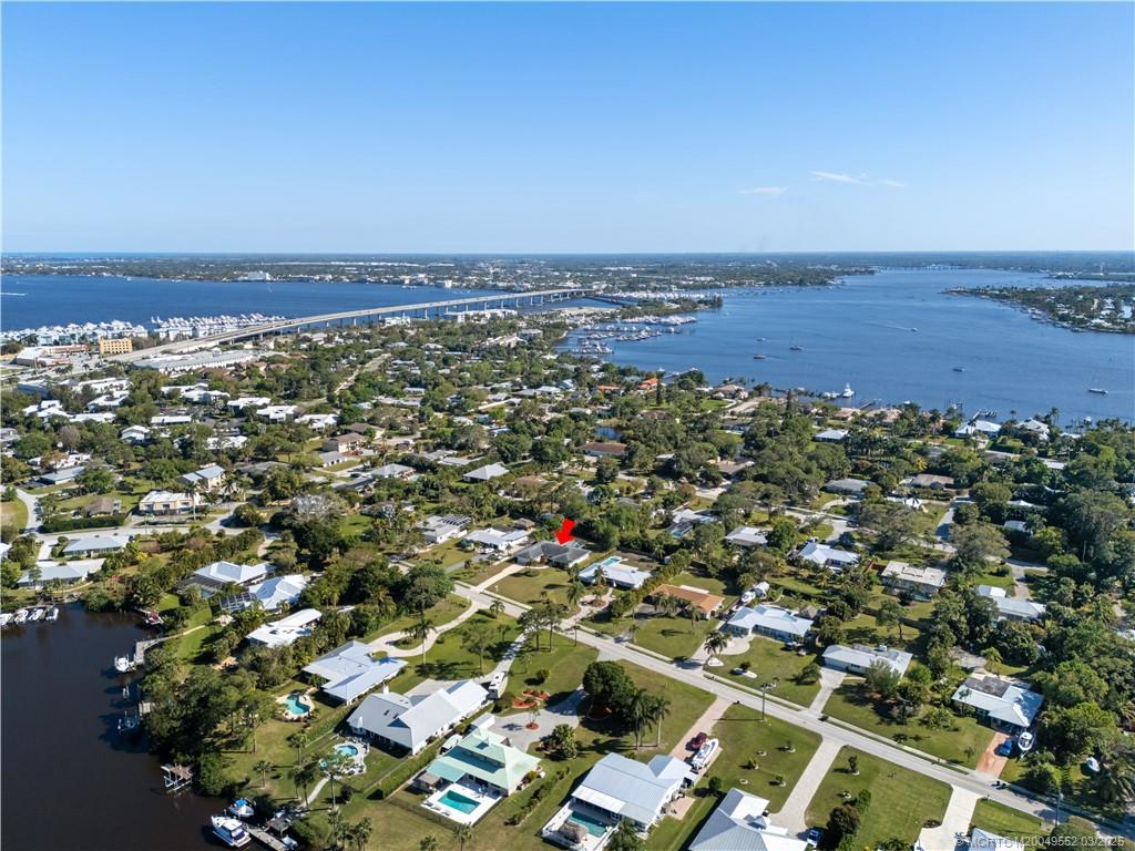 853 Northwest Spruce Ridge Drive Stuart, FL 34994 - Photo 3 of 20 an aerial view of multiple house