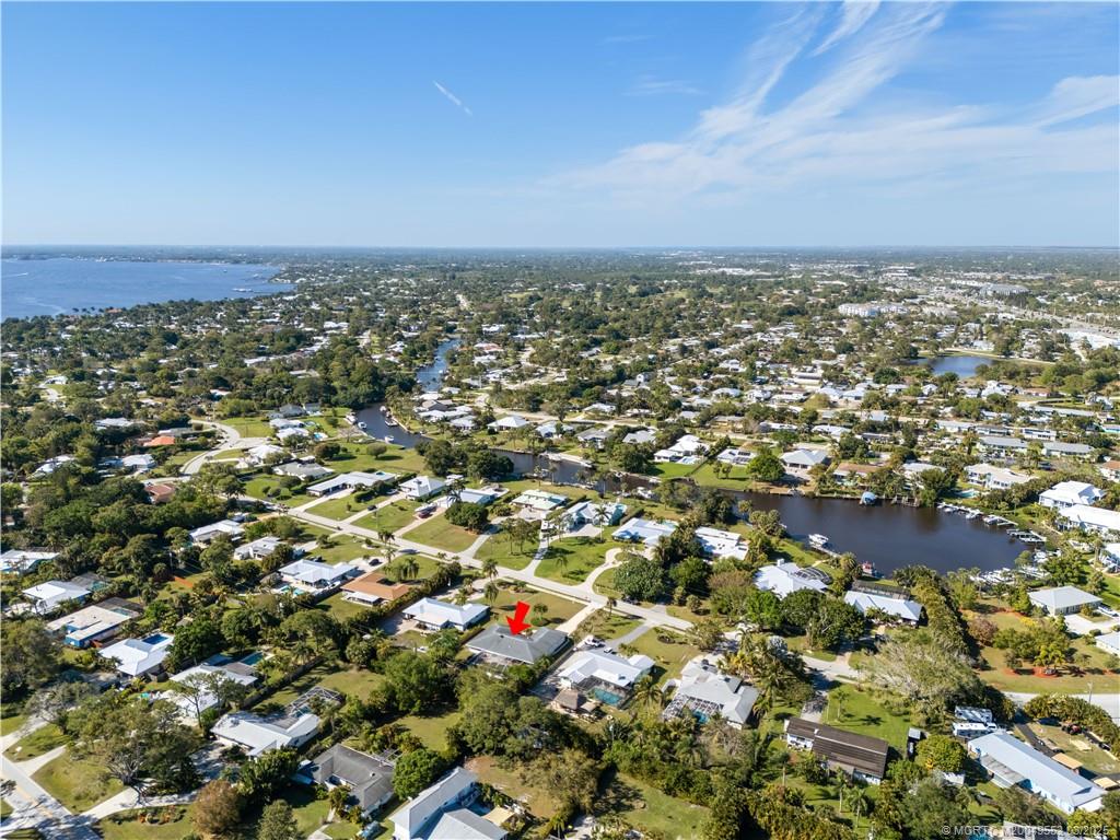 853 Northwest Spruce Ridge Drive Stuart, FL 34994 - Photo 4 of 20 an aerial view of multiple house