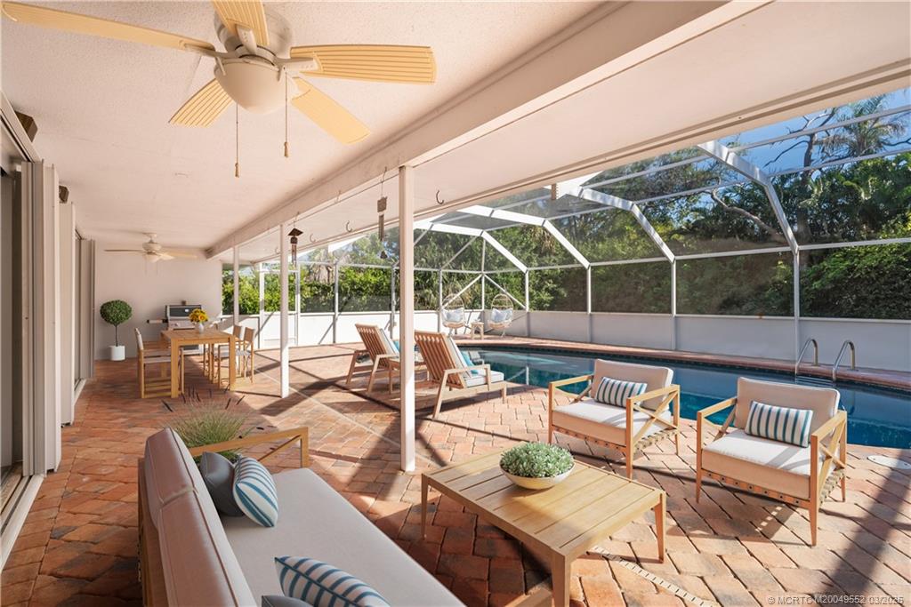 853 Northwest Spruce Ridge Drive Stuart, FL 34994 - Photo 6 of 20 a living room with furniture