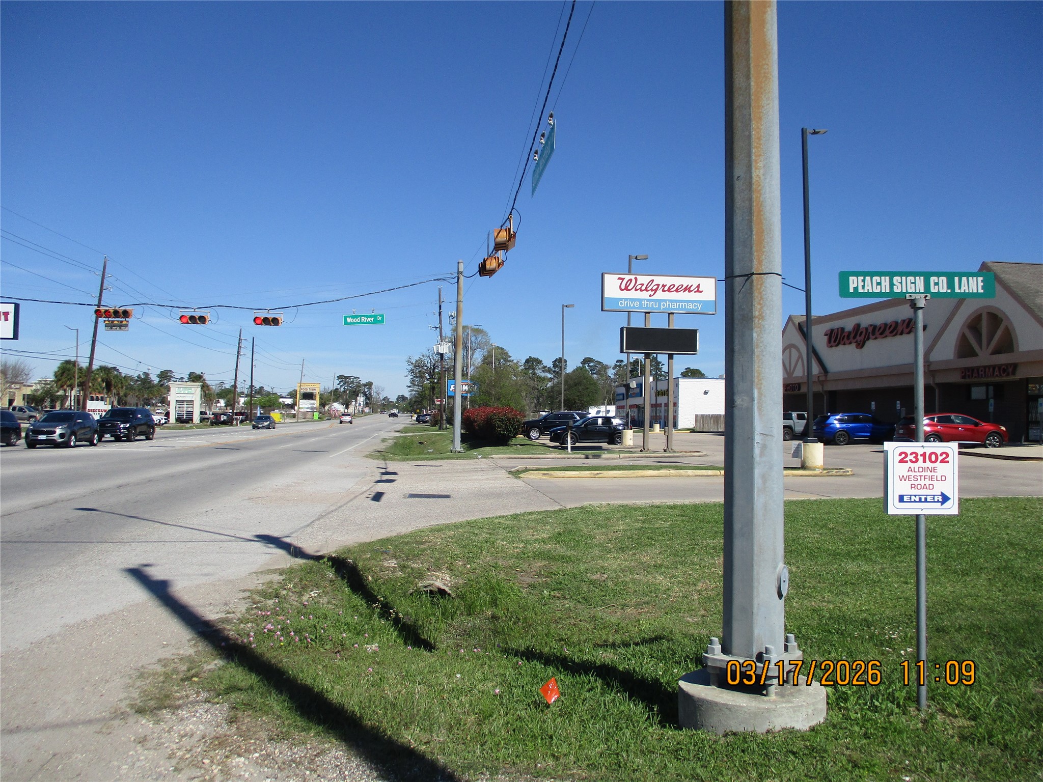 23102 Aldine Westfield Road Spring, TX 77373 - Photo 26 of 39 a view of a street with cars