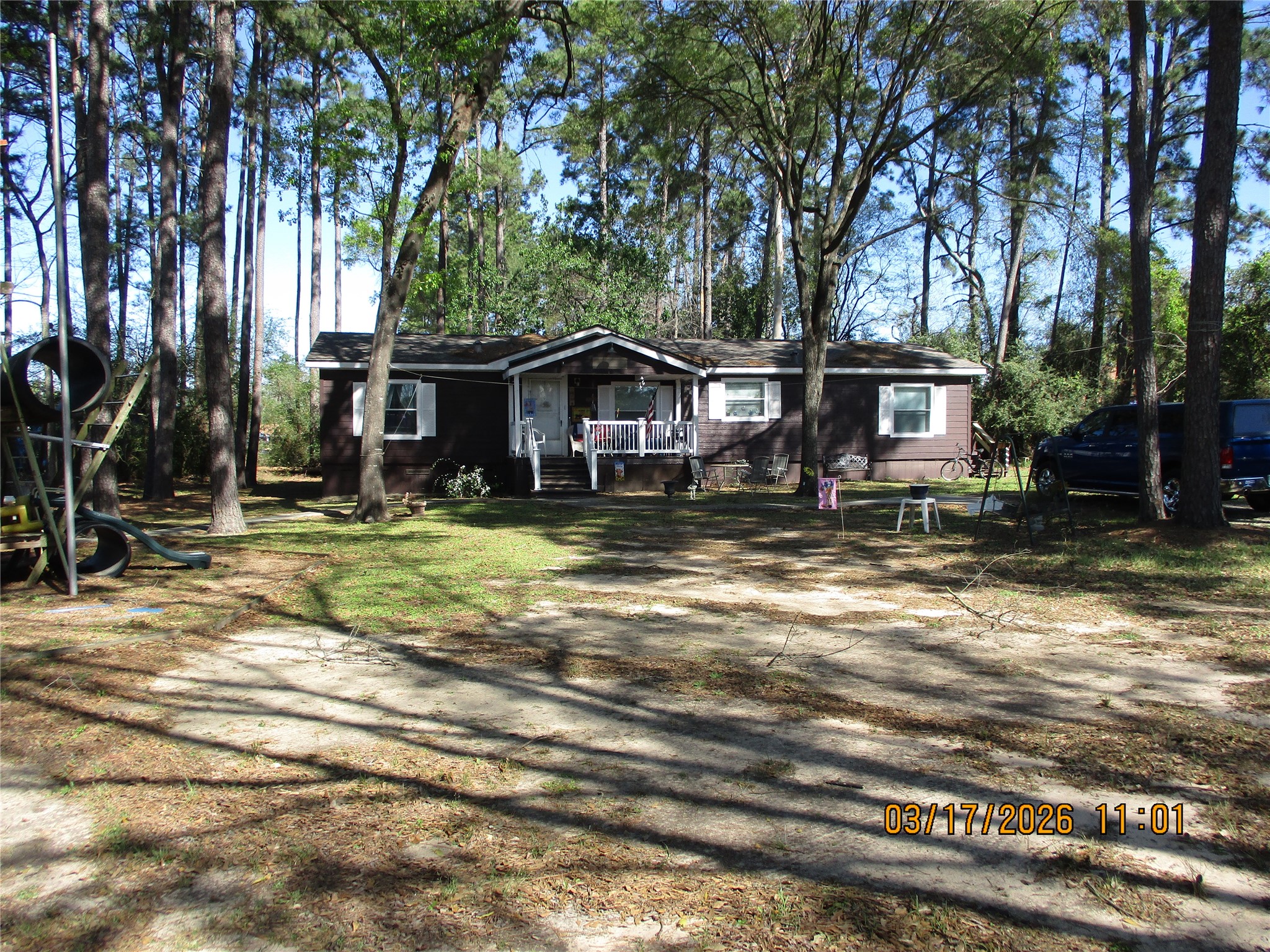 23102 Aldine Westfield Road Spring, TX 77373 - Photo 7 of 39 a view of a house with a big yard and large trees