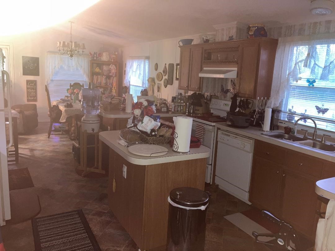 23102 Aldine Westfield Road Spring, TX 77373 - Photo 8 of 39 a kitchen with a sink and cabinets