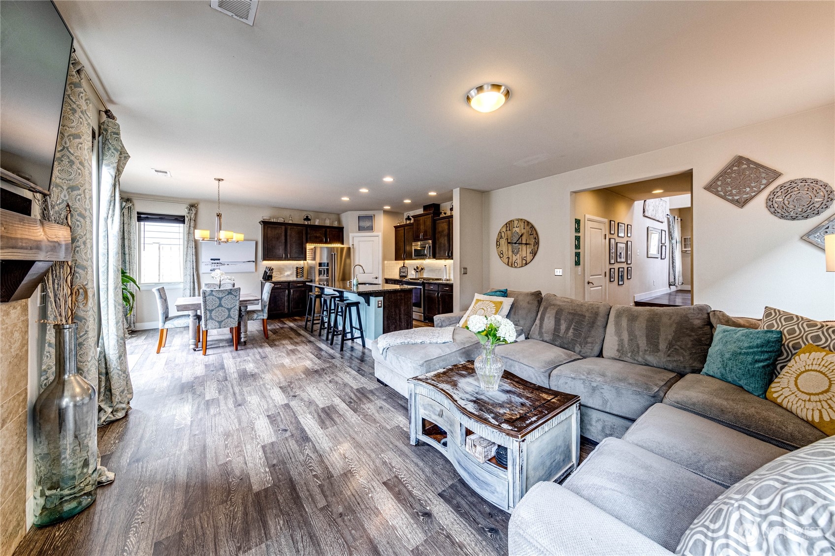 222 202nd Street Southeast Bothell, WA 98012 - Photo 15 of 37 a living room with furniture and a wooden floor
