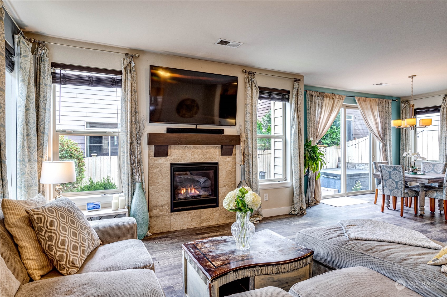 222 202nd Street Southeast Bothell, WA 98012 - Photo 17 of 37 a living room with furniture and a fireplace