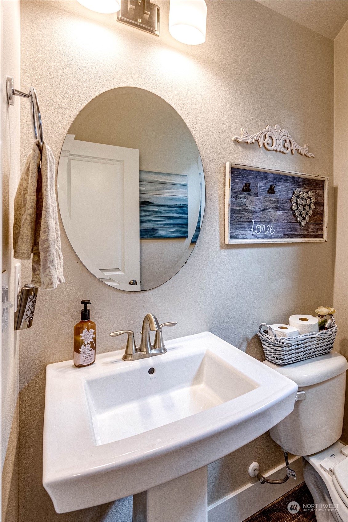 222 202nd Street Southeast Bothell, WA 98012 - Photo 18 of 37 a bathroom with a sink and a mirror