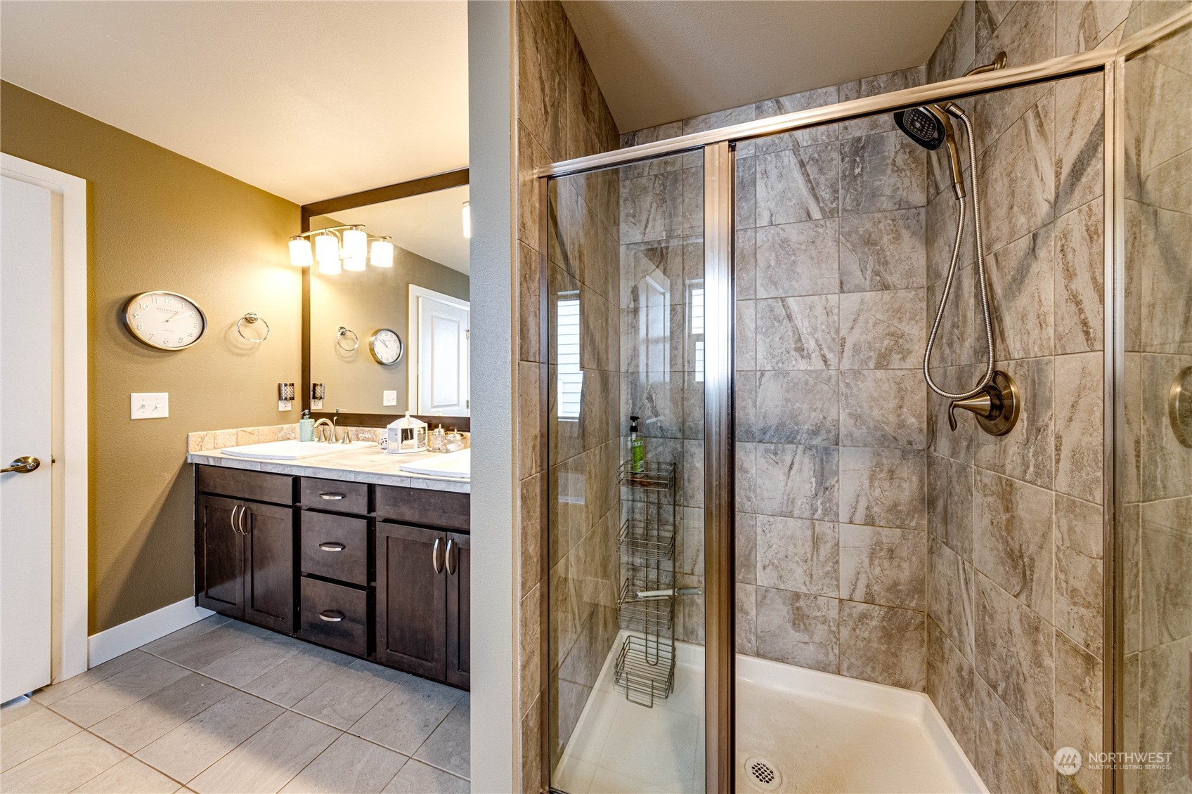 222 202nd Street Southeast Bothell, WA 98012 - Photo 23 of 37 a bathroom with a double vanity sink and a mirror