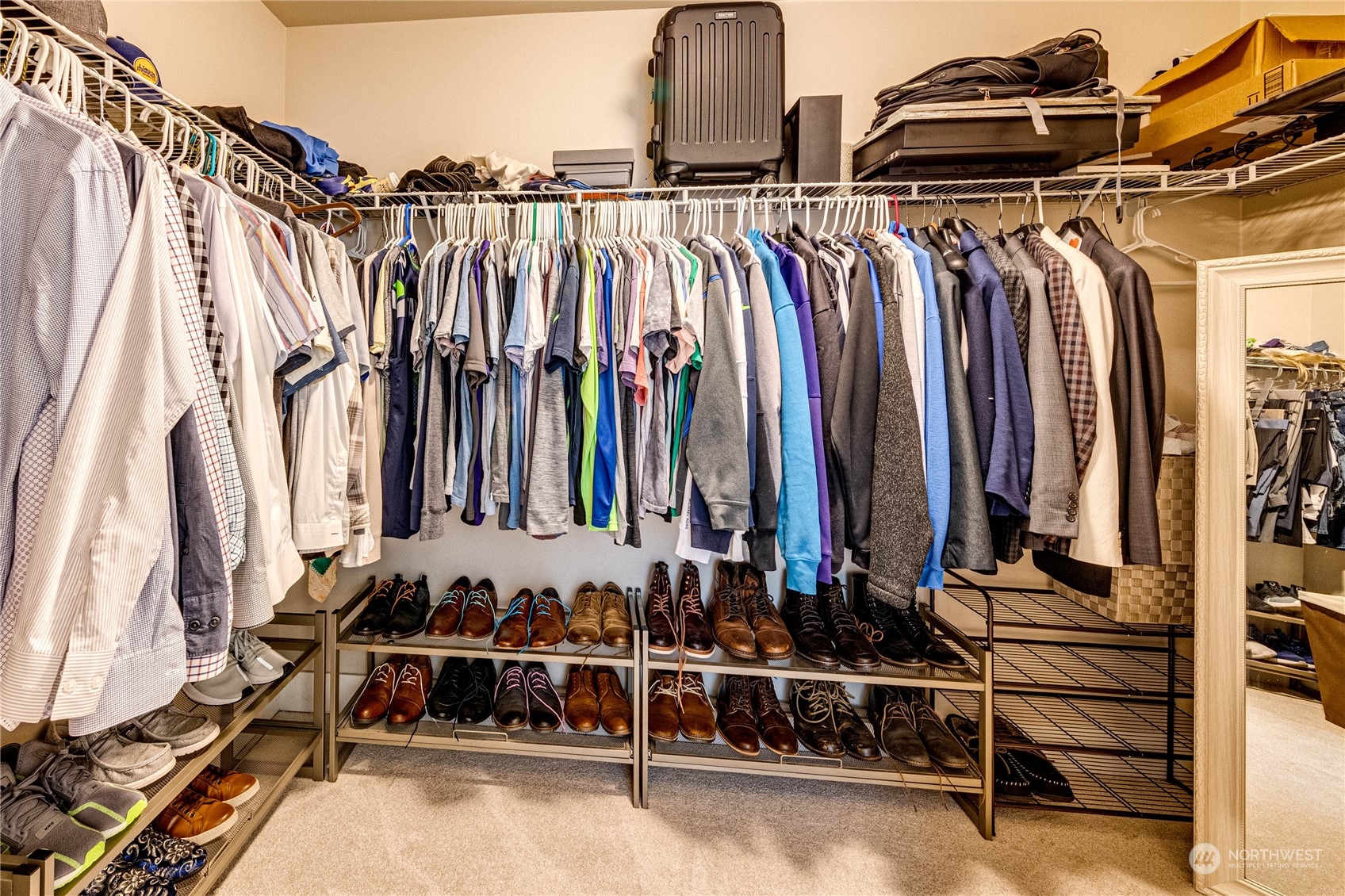 222 202nd Street Southeast Bothell, WA 98012 - Photo 25 of 37 a view of walk in closet with clothes and shoes