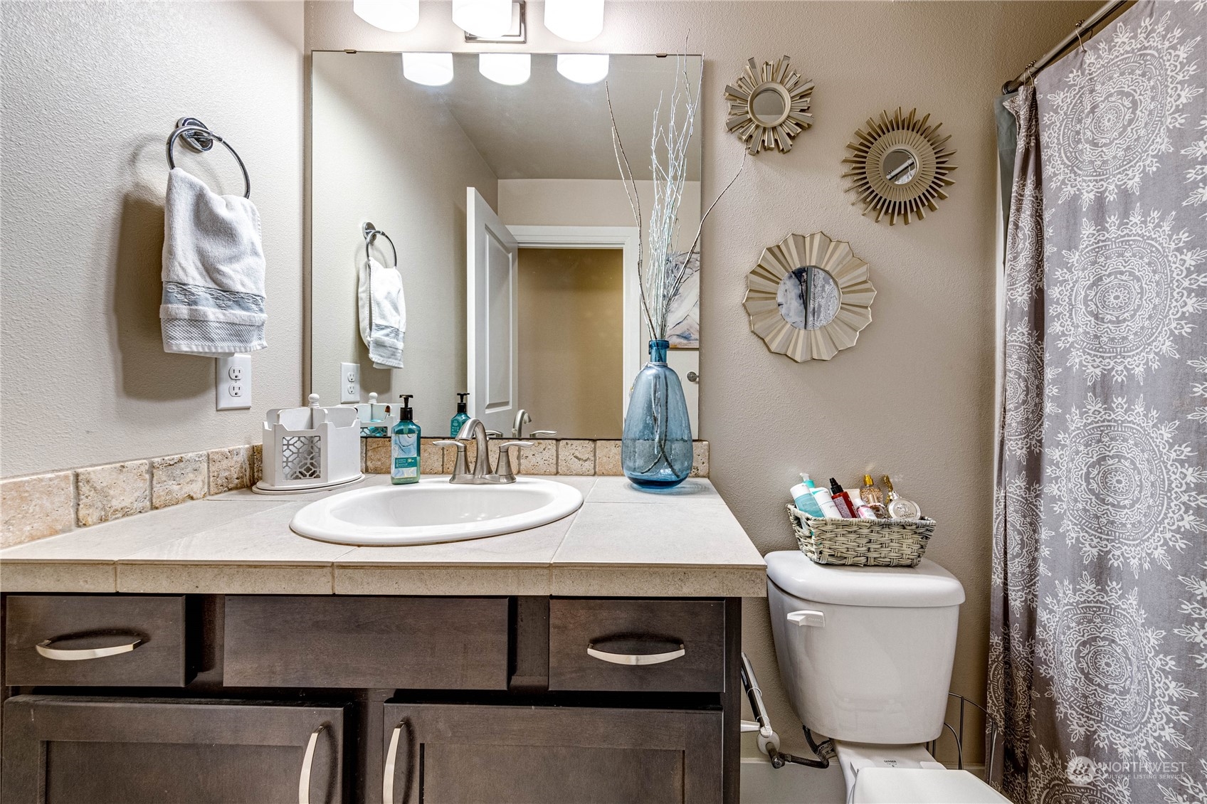 222 202nd Street Southeast Bothell, WA 98012 - Photo 28 of 37 a bathroom with a toilet sink and mirror