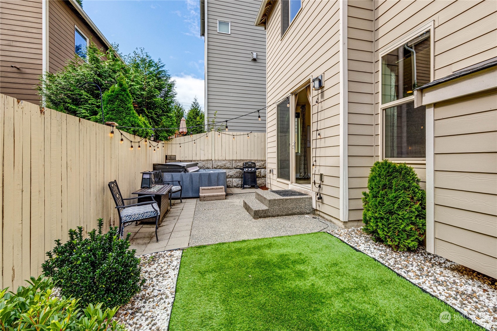 222 202nd Street Southeast Bothell, WA 98012 - Photo 35 of 37 a view of backyard of house with outdoor seating