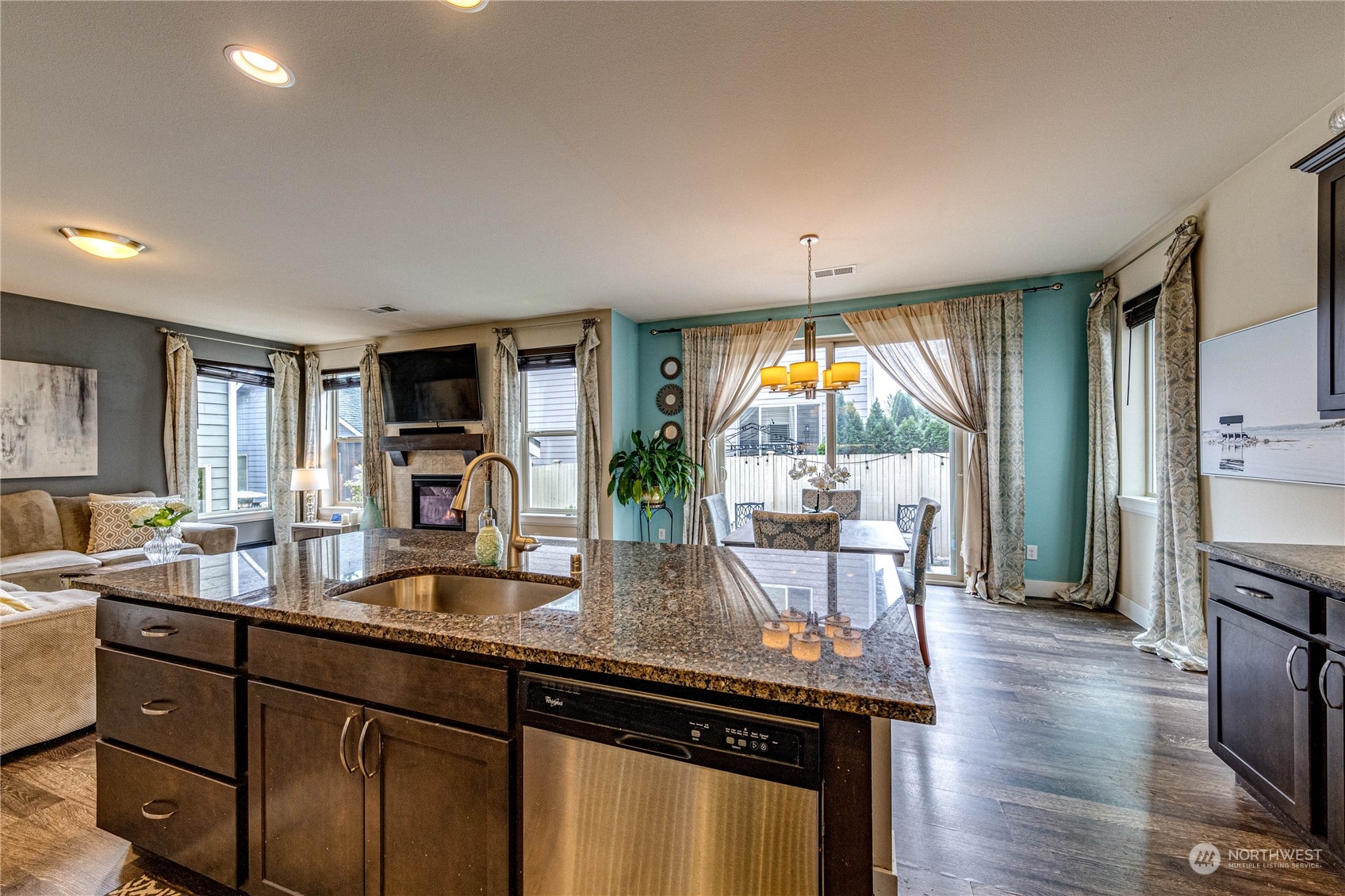 222 202nd Street Southeast Bothell, WA 98012 - Photo 8 of 37 a kitchen with stainless steel appliances granite countertop a stove and refrigerator