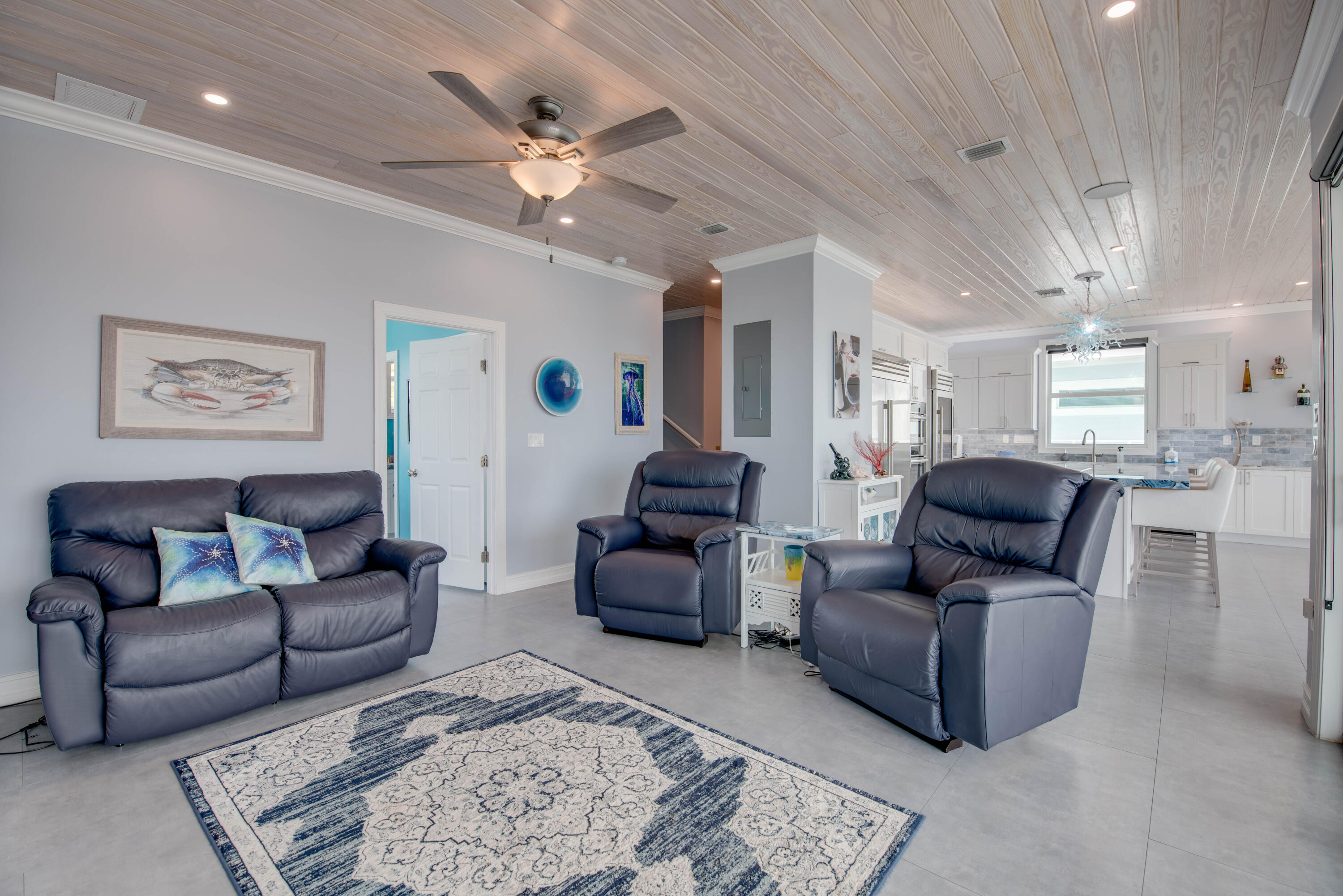 747 La Fitte Road Summerland Key, FL 33042 - Photo 70 of 103 a living room with furniture and a chandelier