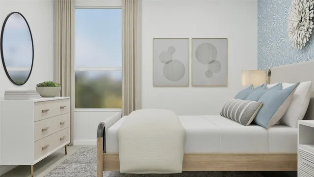 a bedroom with a bed and a mirror