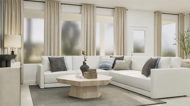 a living room with furniture and a large mirror