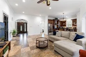 a kitchen with refrigerator a sink and cabinets