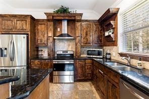 1155 Whipporwill Road Conroe, TX 77303 - Photo 20 of 34 a kitchen with stainless steel appliances granite countertop a refrigerator and a stove