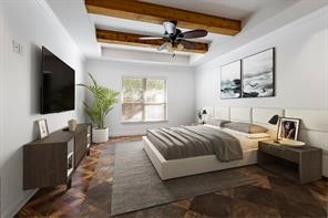 1155 Whipporwill Road Conroe, TX 77303 - Photo 23 of 34 a spacious bedroom with a bed and a flat screen tv