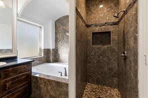 1155 Whipporwill Road Conroe, TX 77303 - Photo 32 of 34 a bathroom with a bathtub and a shower