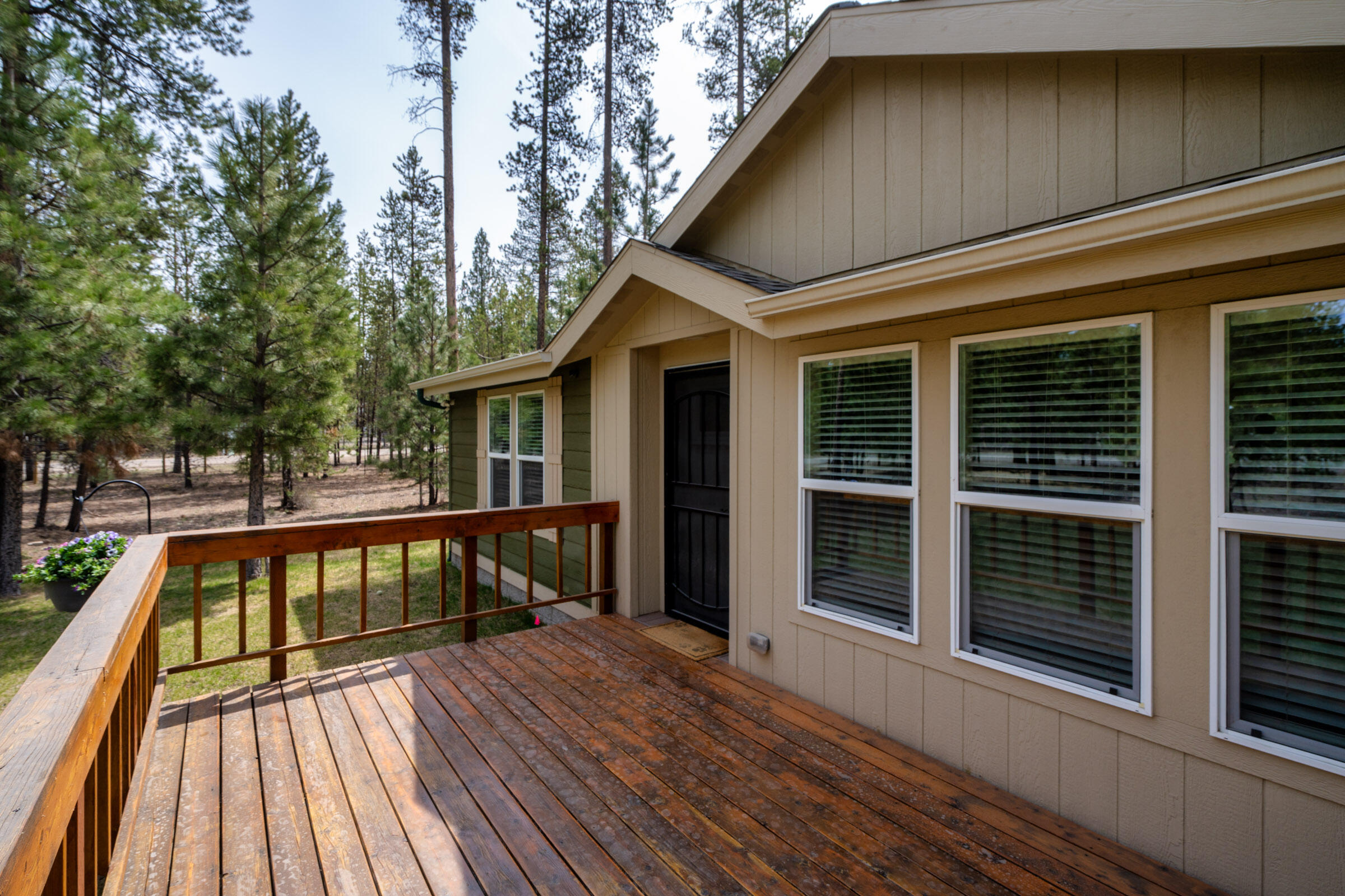 52648 Ammon Road La Pine, OR 97739 - Photo 35 of 44 a view of wooden house with a large window