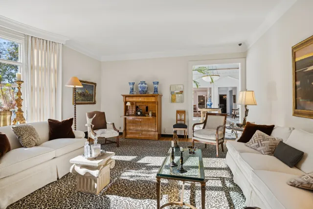 a bathroom with sinks a mirror and a shower
