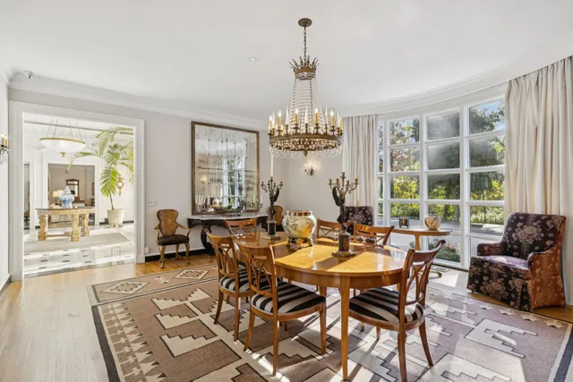 a kitchen with stainless steel appliances a sink stove and refrigerator
