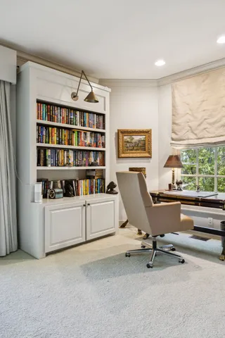 a backyard of a house with lots of green space and trees