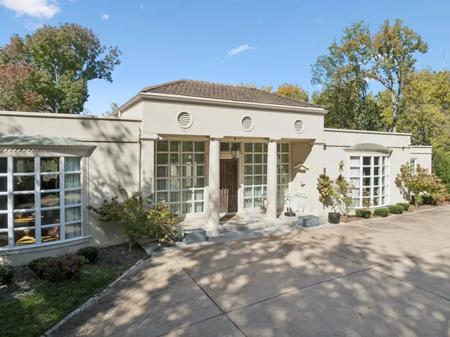 a view of a living room and dining room