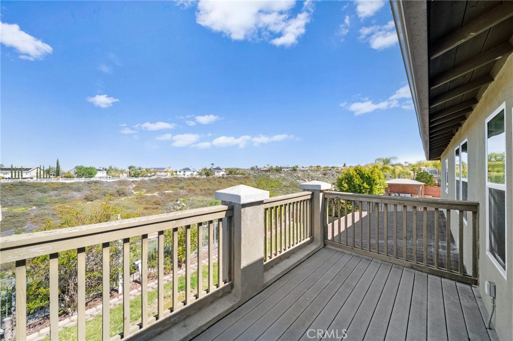33710 Sattui Street Temecula, CA 92592 - Photo 9 of 75 a view of city from a balcony with wooden floor