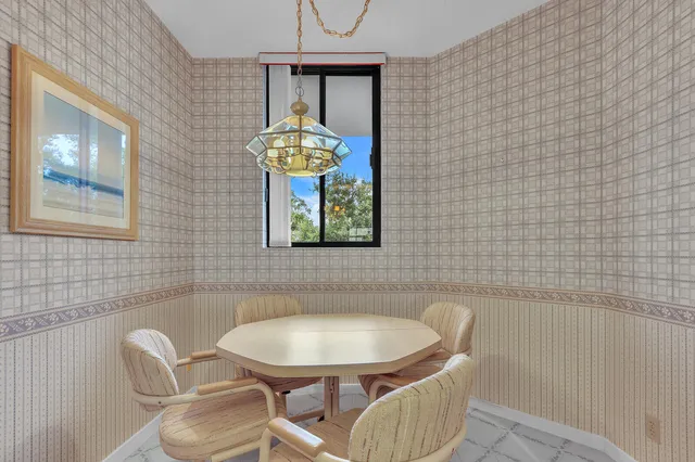 a bathroom with a blue sink and a mirror