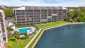a view of a swimming pool with a lounge chair