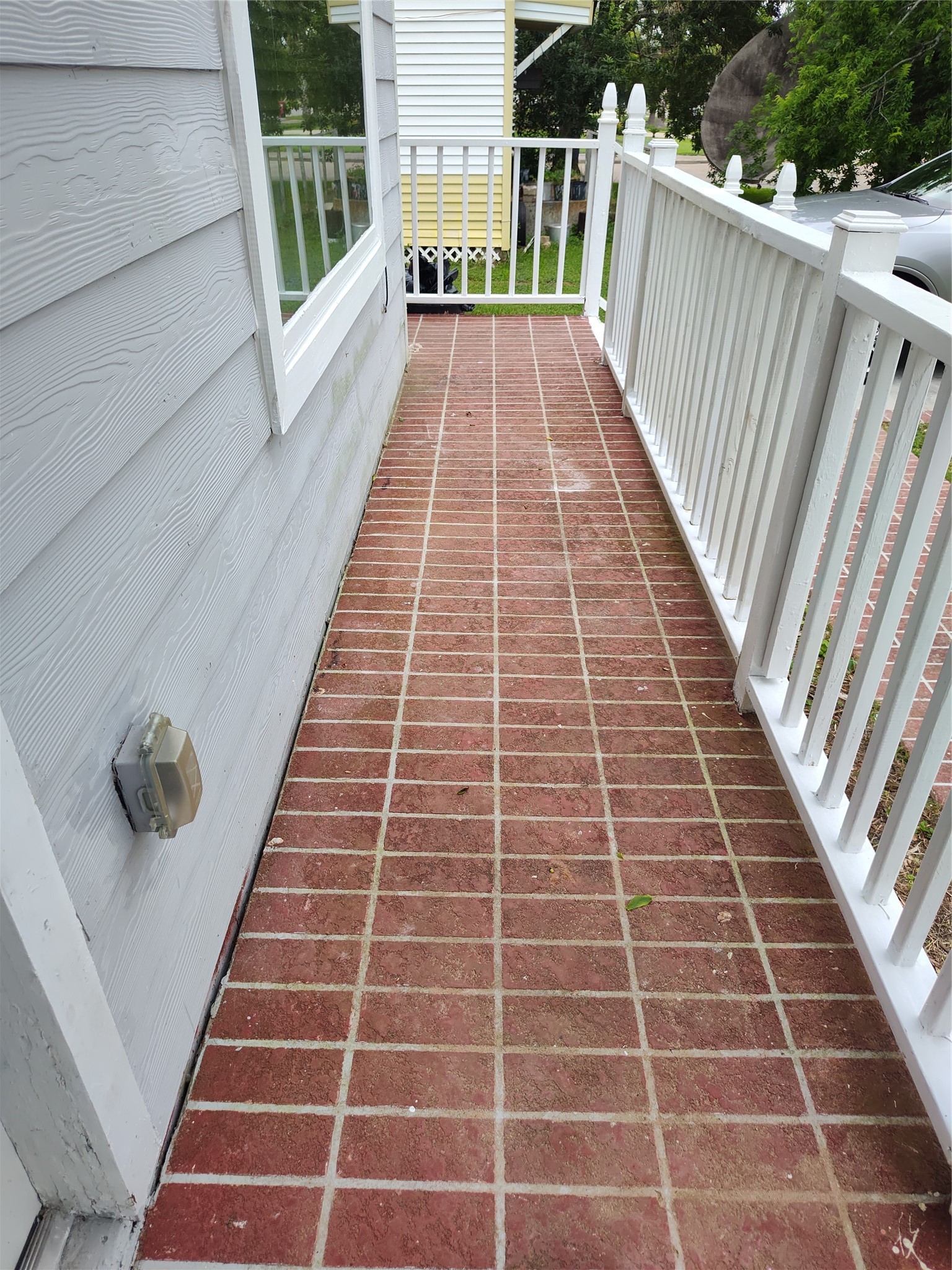 527 West 6th Street Freeport, TX 77541 - Photo 21 of 25 a view of a balcony with door