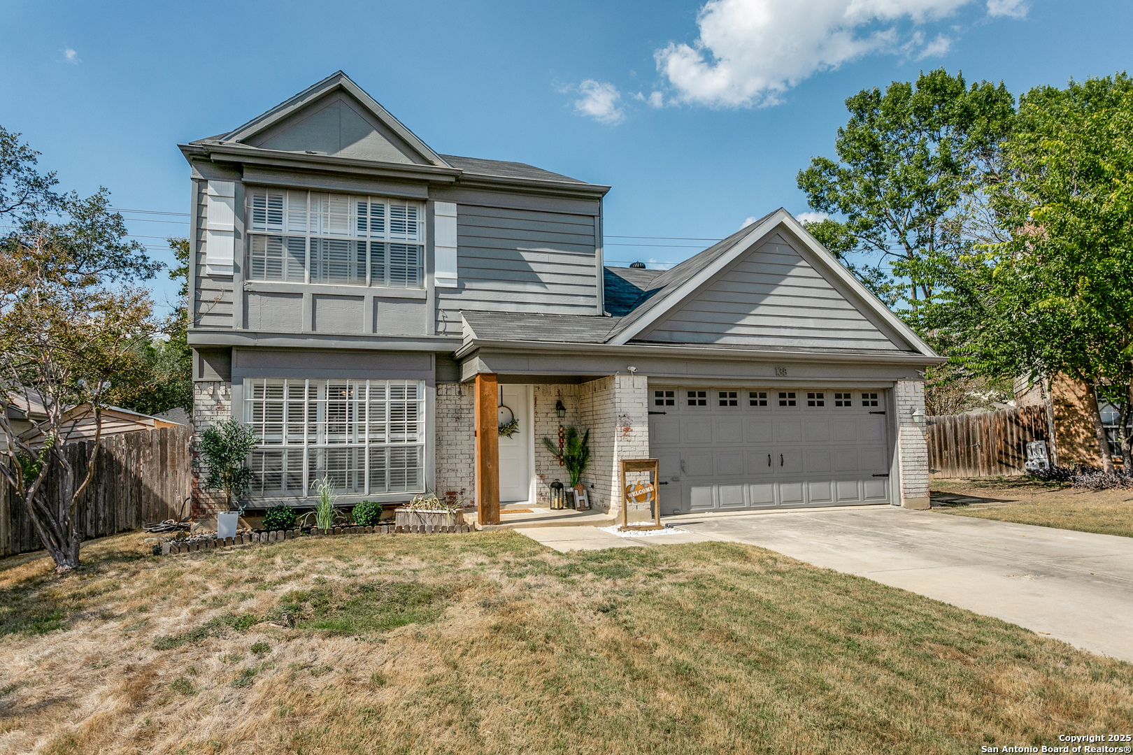 138 Sweetleaf Lane Cibolo, TX 78108 - Photo 2 of 21 a front view of a house with a yard