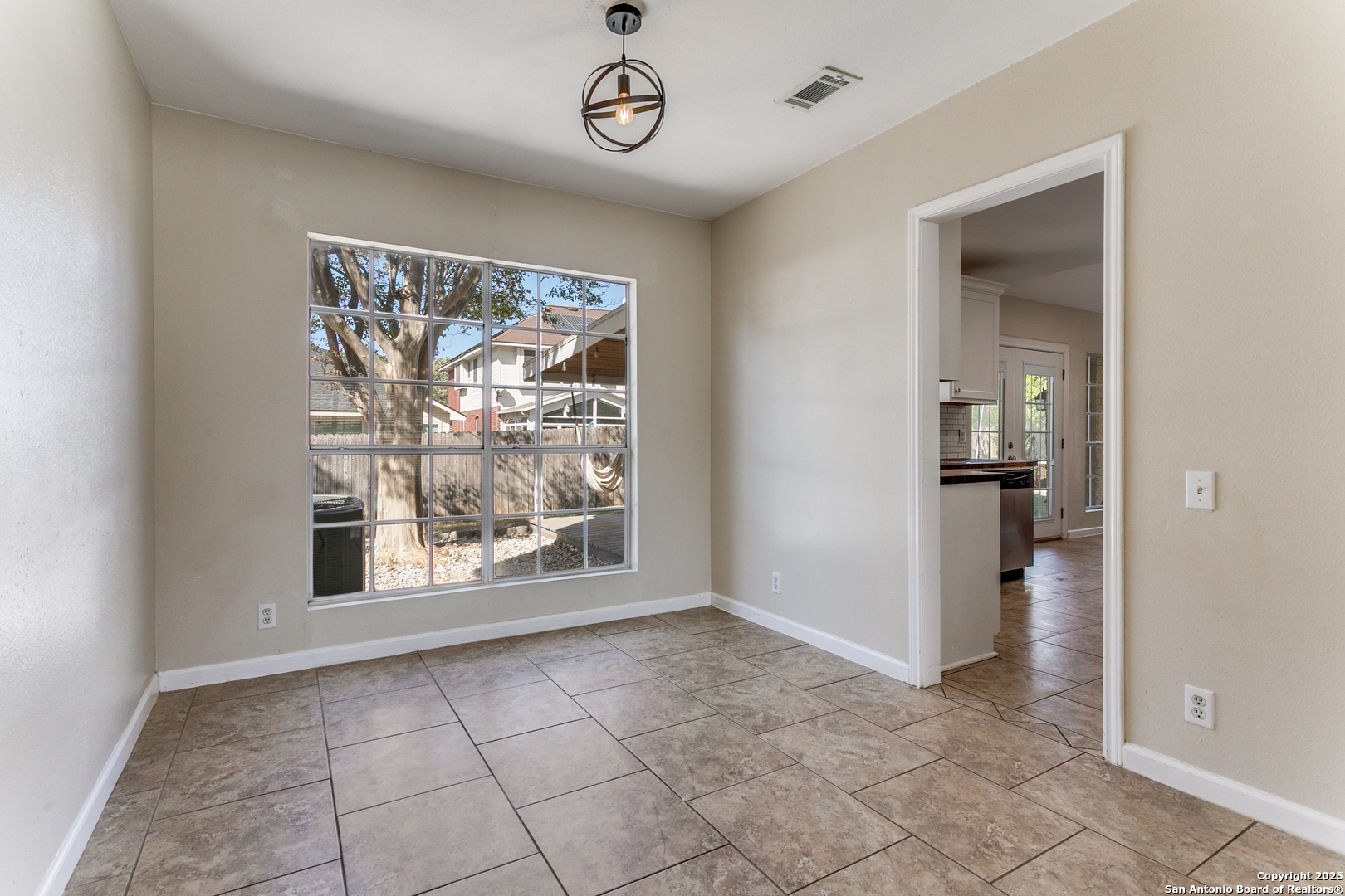 138 Sweetleaf Lane Cibolo, TX 78108 - Photo 5 of 21 an empty room with large windows
