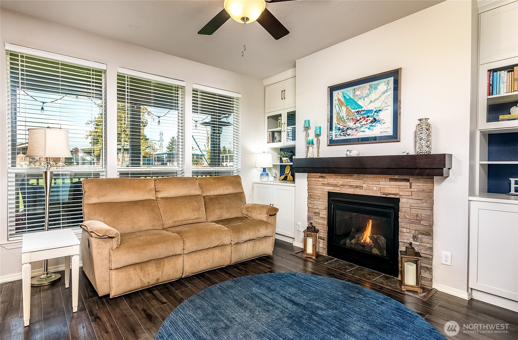 2101 South 324th Street, Unit 53 Federal Way, WA 98003 - Photo 12 of 38 a living room with furniture and a fireplace