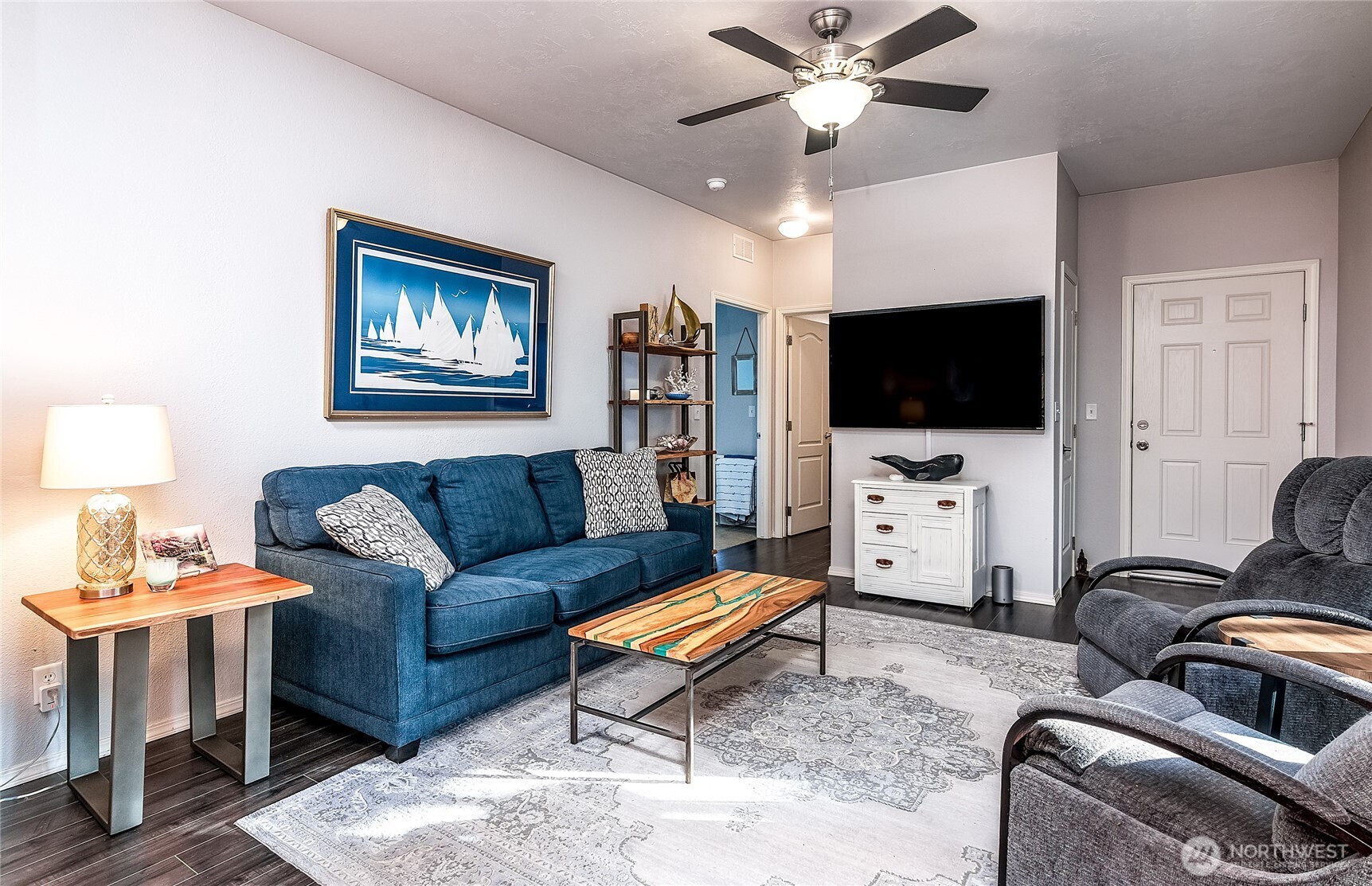 2101 South 324th Street, Unit 53 Federal Way, WA 98003 - Photo 14 of 38 a living room with furniture and a flat screen tv