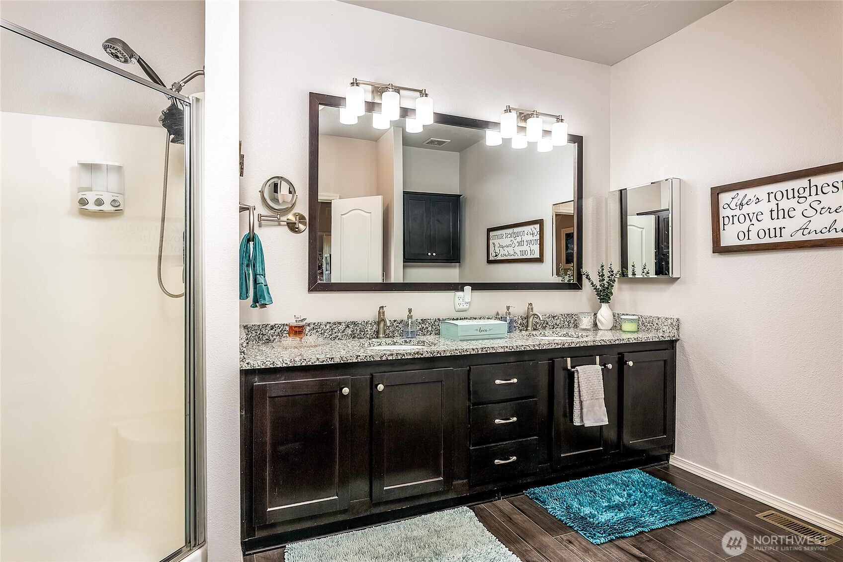 2101 South 324th Street, Unit 53 Federal Way, WA 98003 - Photo 18 of 38 a bathroom with a granite countertop sink a mirror and a shower