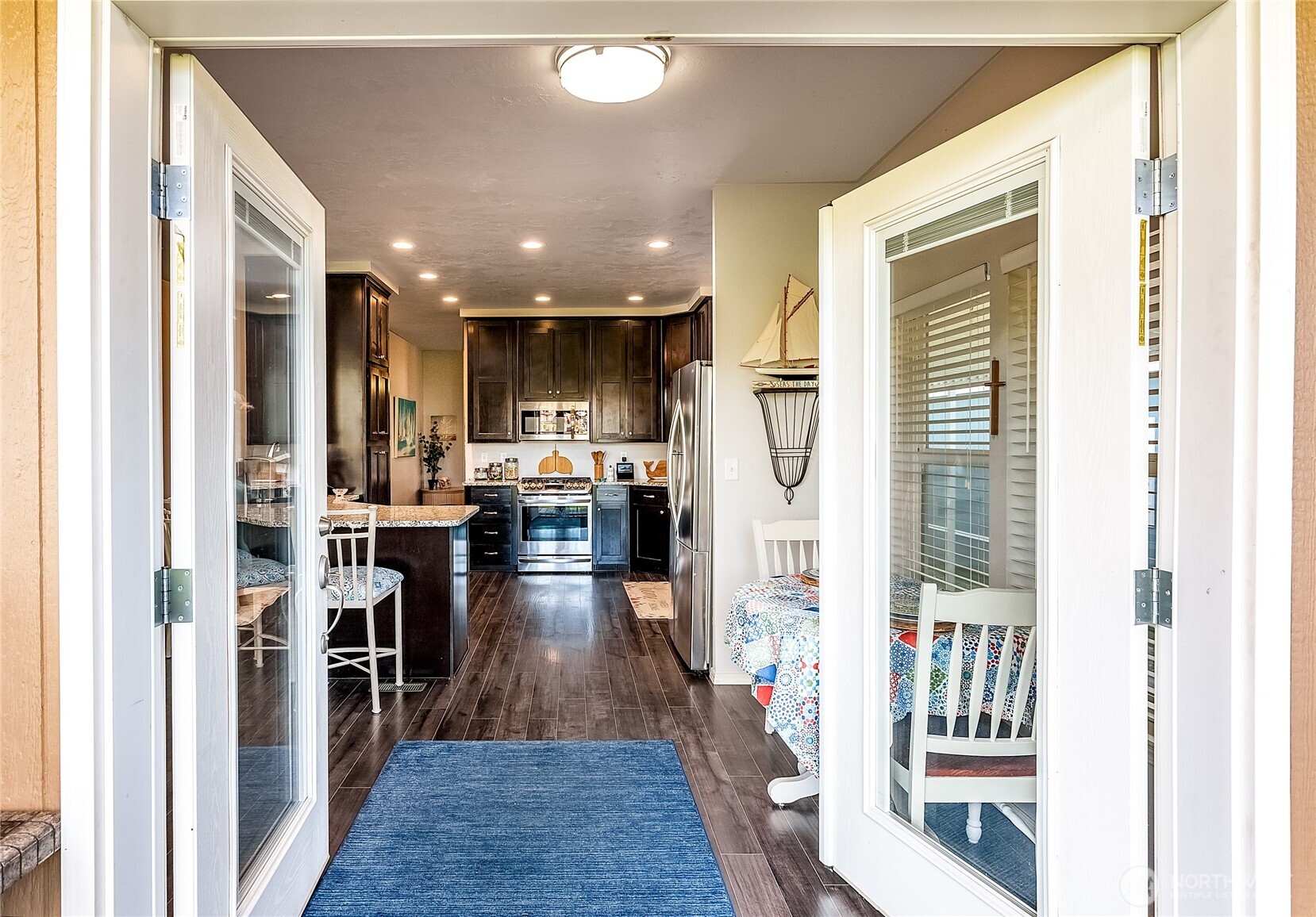 2101 South 324th Street, Unit 53 Federal Way, WA 98003 - Photo 21 of 38 a view of a kitchen from the hallway