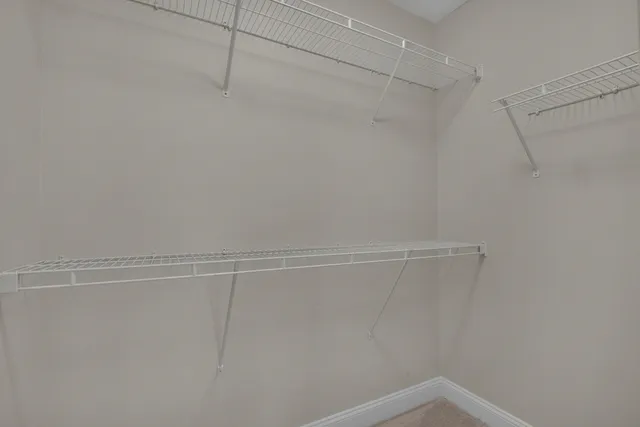 a view of a room with racks on the wall