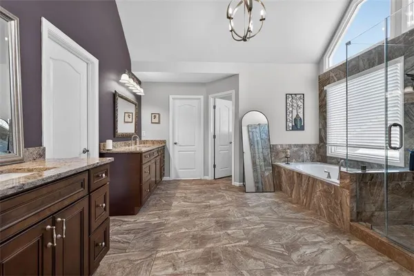 a room with furniture pool table and window