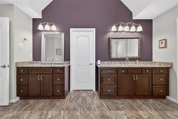 a view of a livingroom with furniture window and wooden floor