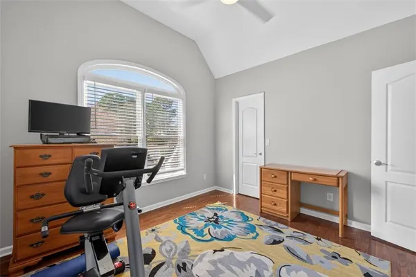 a aerial view of a house with garden space and sitting area
