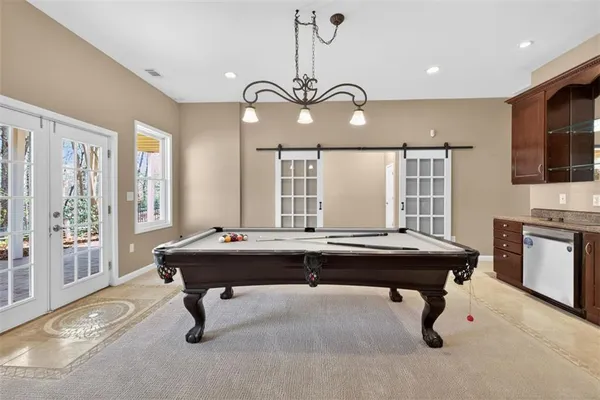 a front view of a building with garden