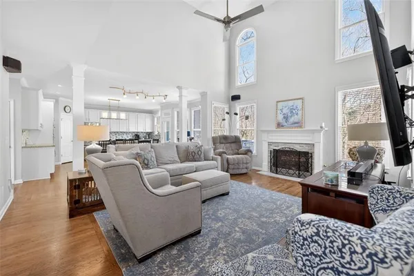 a living room with furniture and a flat screen tv