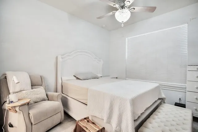 a bathroom with a sink vanity granite and toilet