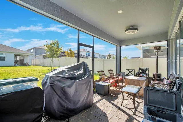 a room with furniture and a window