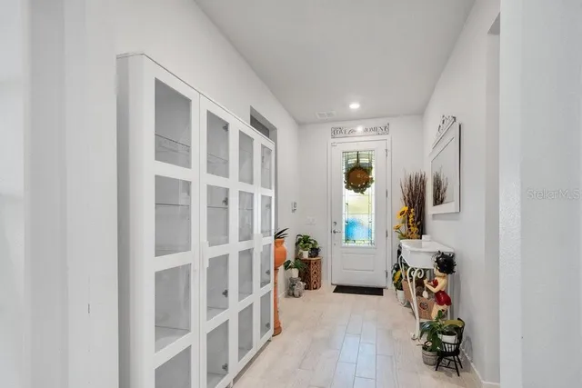 a view of livingroom with furniture and closet