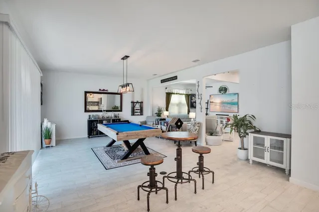 a workspace with furniture and a window