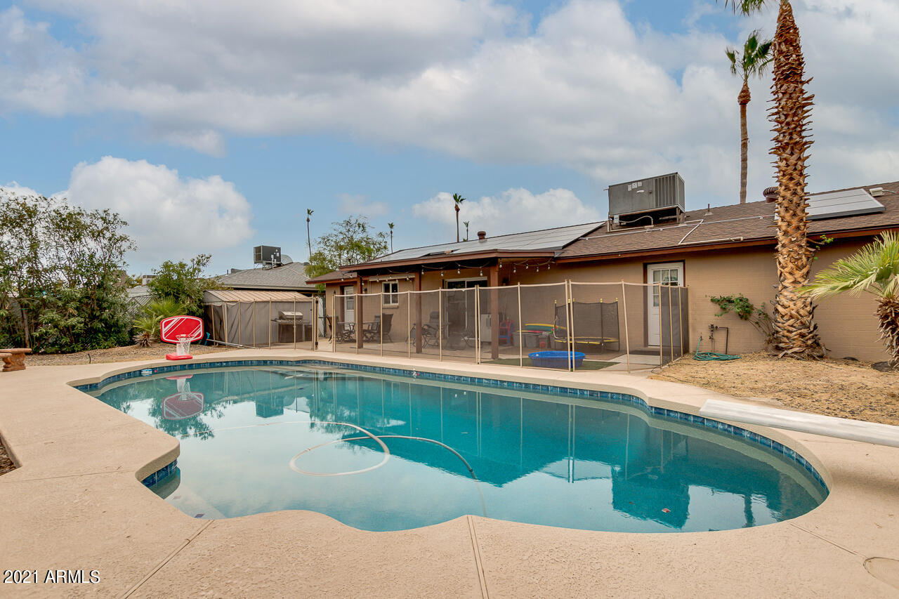 4215 West Dailey Street Phoenix, AZ 85053 - Photo 32 of 32 a view of a house with swimming pool