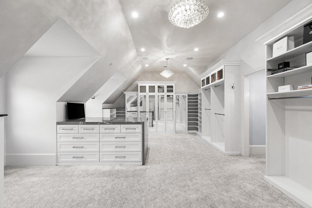 40 Grandview Road Chelmsford, MA 01824 - Photo 21 of 42 a view of hall with stairs and a chandelier